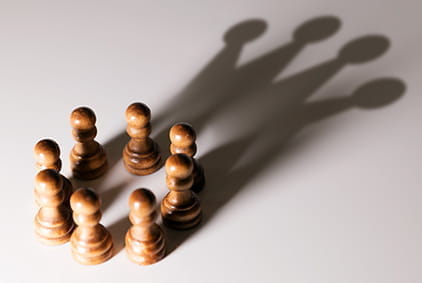 Chess pieces arranged in a circle.