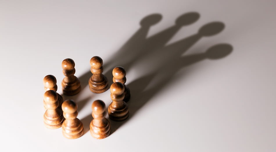 Chess pieces arranged in a circle.