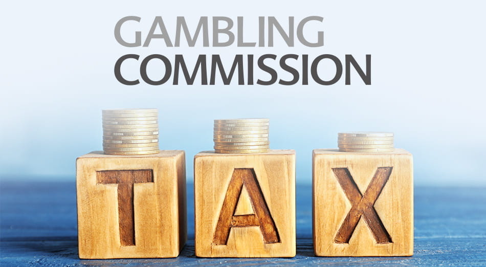 Gambling commission's logo and wood block spelling the word tax.