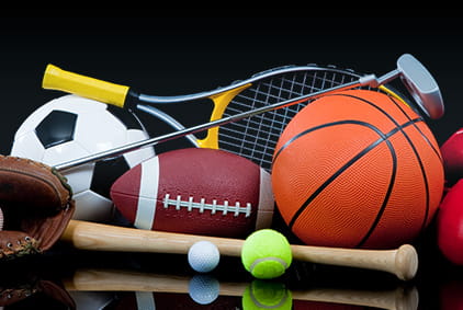 Image Of Basketball, Helmets and Baseball Bat