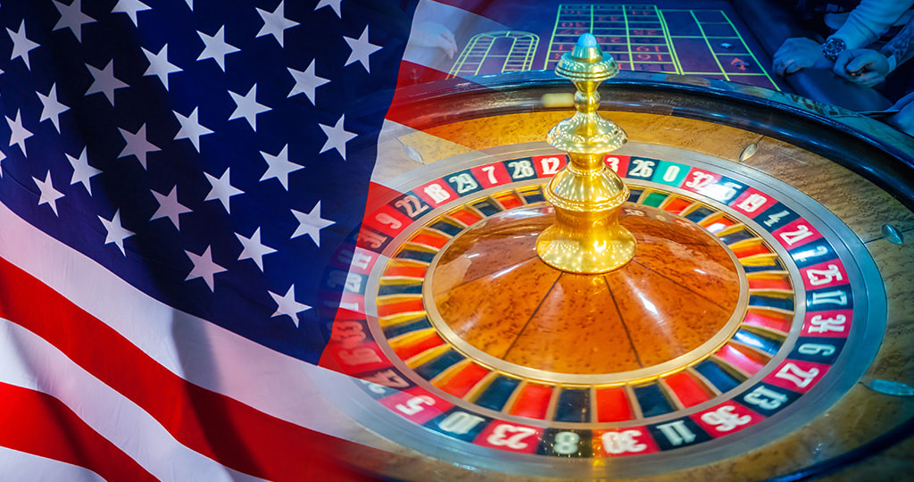 A roulette wheel set against the US flag 