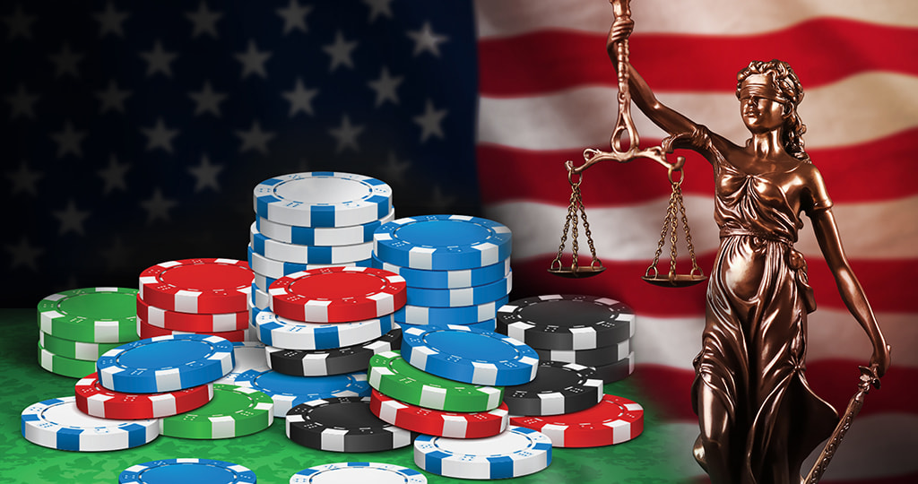 Scales of justice by a UK flag and betting chips 